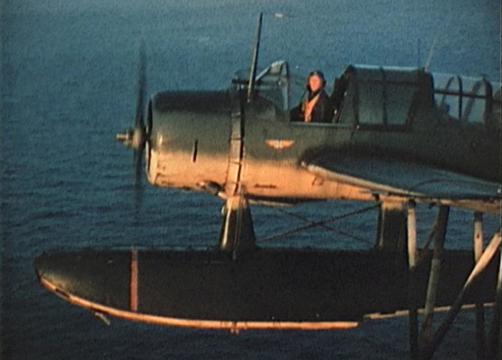 Top: LT Charles Tanner in his Kingfisher floatplane.