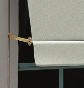 Suitable for shading ground floor windows. Basic headbox protects the fabric when not in use.