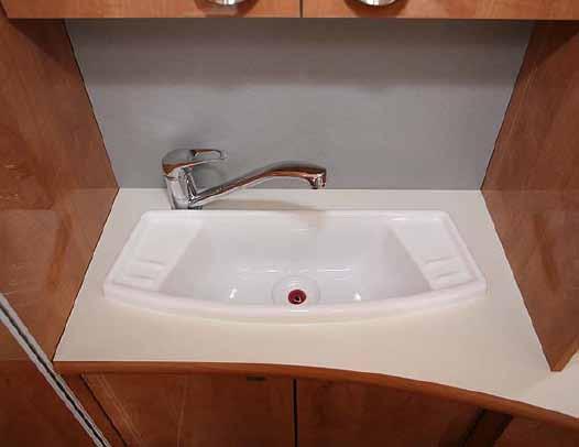 What it doesn t have is a hand basin/vanity unit, because that is located outside the cubicle, between it and the kitchen bench.