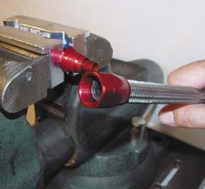 Continue tightening by hand as far as possible to make sure that the threads are properly mated and no cross