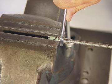 Push forward on the tube, allowing the flaring edge of the tool to firmly seat the olive on the tube.
