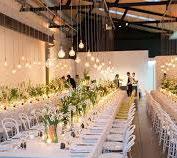 stunning burnished concrete floors, neutral white walls and discrete lighting. The venue offers a blank canvas and provides couples the opportunity to create the wedding of their dreams.