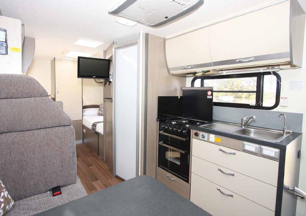 Cooks will welcome a full cooktop, grill and oven. with their feet up. Any other viewers are going to be sitting in the swivelled cab seats.