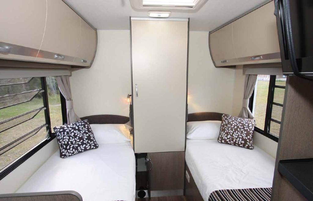 Fixed length single beds will suit shorter travellers. Note good ventilation and storage. Over-cab bed is generous and best for taller travellers.