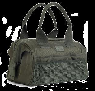 The main compartment features a rigid wide-mouth zippered opening for easy access to all contents.
