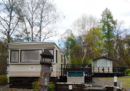 INTRODUCTION Twenty Shilling Wood Caravan Park is a well located mixed touring and static caravan park within the popular tourist region of Perthshire, overlooking the River Earn.