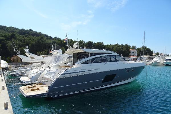 2013 SOLD Ref:PA0498 2013 MODEL PRINCESS V52 MOTOR YACHT FOR SALE FITTED WITH: Twin Caterpillar C12 Acert diesel engines (715 hp each) 3 cabin version Steel Grey hull Light Oak Satin Interior
