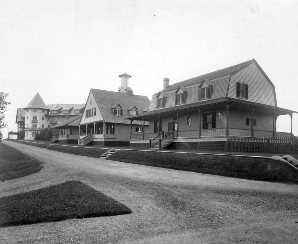 THE ALGONQUIN Cottage Row, seen here from Harriet and Prince of Wales streets. Cottage guests such as C.R. Hosmer, F.W. Thompson and John Hope built larger and more beautiful summer homes next to the Algonquin within a very short time.
