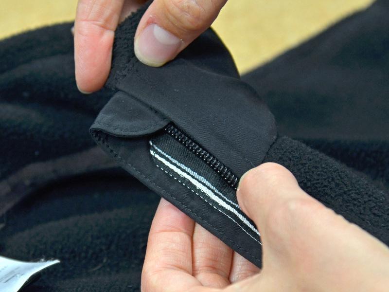 webbing that covers the zipper seam.
