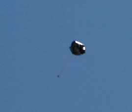 Photo 7: Parachutes in air Table 11: launch data Flight 1 2 3 Motor D12-3 D12-3 D12-3 Wind 6.5 Knots 5.0knots 3.