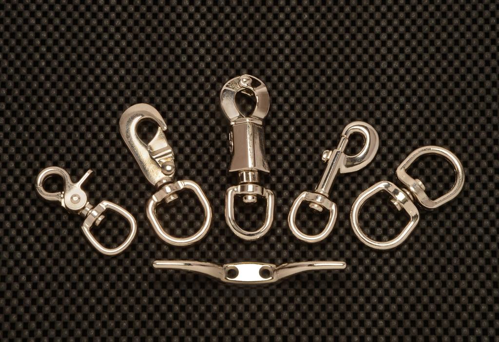 Call Today 1 800 833 9598 Nickel Plated Zinc Die Cast Henssgen Hardware s fixed and swivel snap hooks are found in this section; they are Die Cast from a Zinc Alloy and then nickel plated to a high