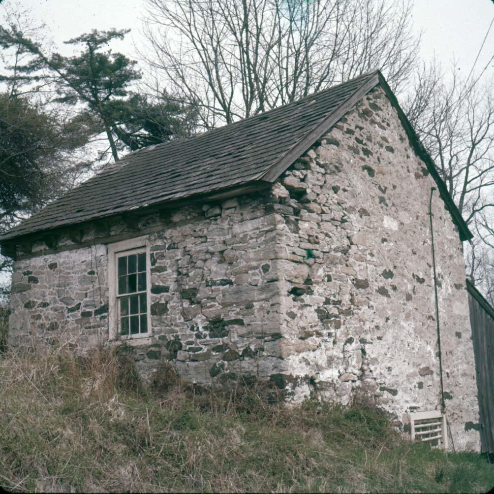 Springhouse, back, across from John Chad House April 18, 1959,