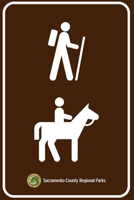 These signs shall inform potential users of the existence and location of the legal riding network, point out their current location, and state that
