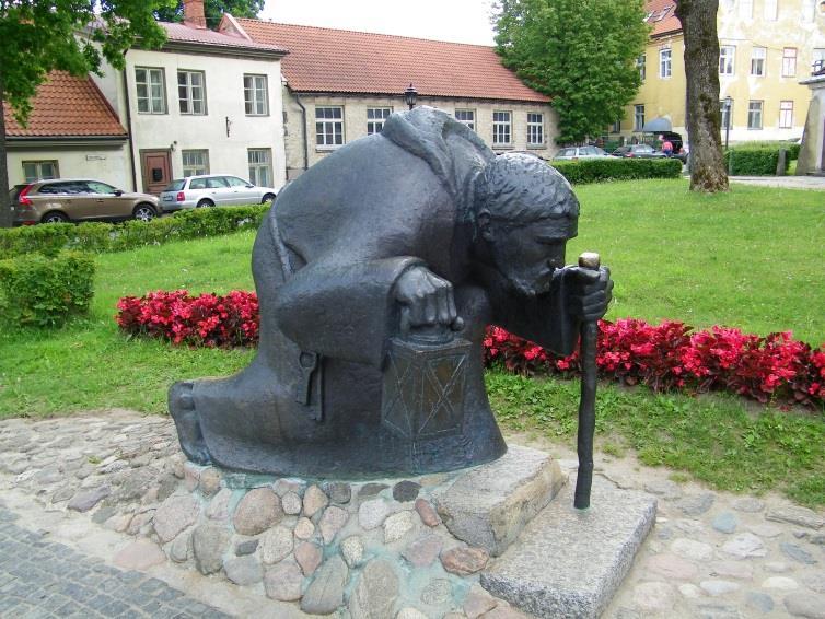 This Cēsis statue pays tribute to a monk who once walked the streets of town at night carrying a lantern.