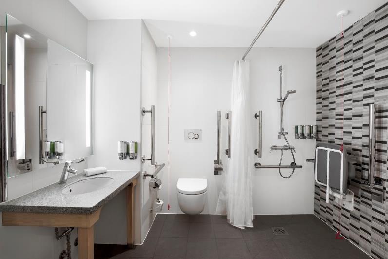 All accessible rooms have grab rails around the toilet, a low level sink and an emergency pull cord Enhanced hearing facilities: A text phone and a TV loop system is available via request prior to
