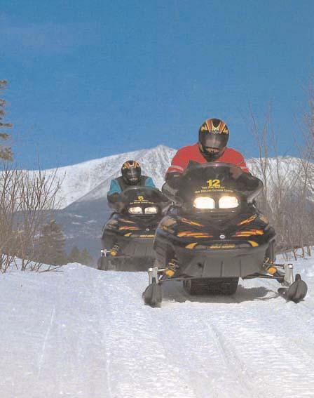 snowmobile vacation with everything you need rental sleds, clothing, guide