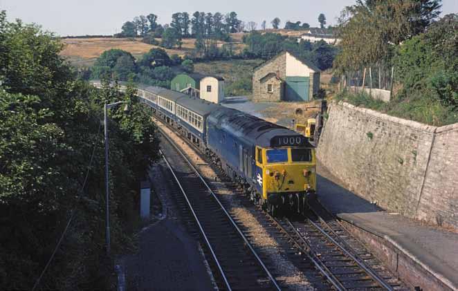 PLYMOUTH TO PENZANCE ROGER GEACH Class 50 No. 50045 is seen passing Saltash station with the 08:35 Penzance to Paddington on a very warm August 13, 1976.