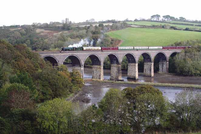 The houses of Saltash stand out high on the hillside above the viaduct, while below there are a number of yachts moored on the Tamar. On October 21, 2006 King Class 4-6-0 No.