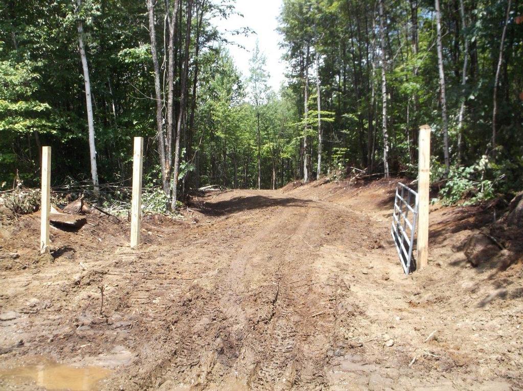 Installation of gate and ATV pass-thru to protect new trail.