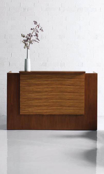 Finish: Gunstock Walnut Modesty: Zebrawood - Clear Finish Edge: Knife Reception station with exotic facade panel greets visitors with boldness and style.