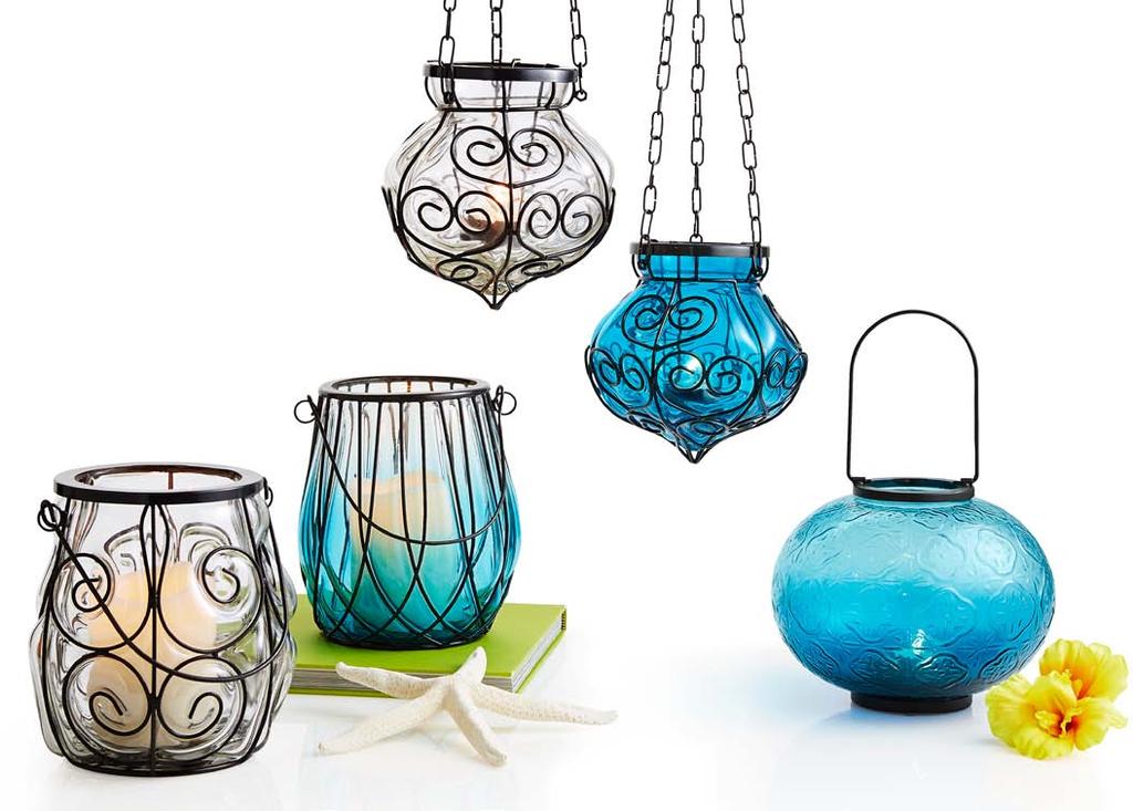 c. d. Mouth-blown glass shaped by wrought iron, these caged lanterns are a few of our new favorites. a. e. a. Clear Caged Glass Lantern 61/2" dia.