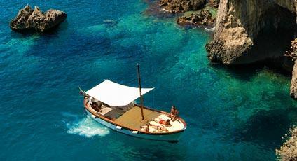 Capri Boat Tour Tour the island by gozzo, the local traditional boat, and enjoy the beauty of Capri s nature!