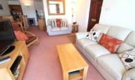 Th is self-caterin g h oliday flat offers fabulous views with interesting and ever