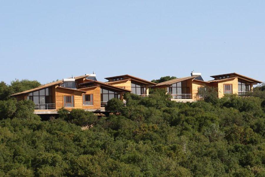 ACCOMMODATION AJLOUN AJLOUN CABINS AND BUNGALOWS Located in a grassy clearing in the Ajloun Forest Reserve surrounded by oak, pistachio and strawberry trees, are 5 cabins and 10 tented bungalows.