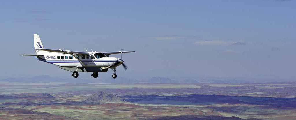 12-seater Cessna Caravan flying guests between camps (Sossusvlei) Private guest lounge, Hosea Kutako International Airport (Windhoek) Between Camps From the moment you arrive in Africa, to your