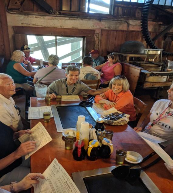 worrying group of 12 club members and 4 guests at the Titusville Cracker Barrel