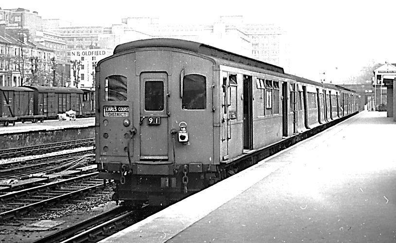 Busier exhibitions required the use of six-car trains and an ex-k class motor is seen (Below, Left) in a mixed Q Stock formation, the Q38 cars (second and third) being prominent with their flared