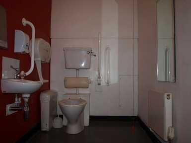 Accessible toilet with baby change facility on ground floor.