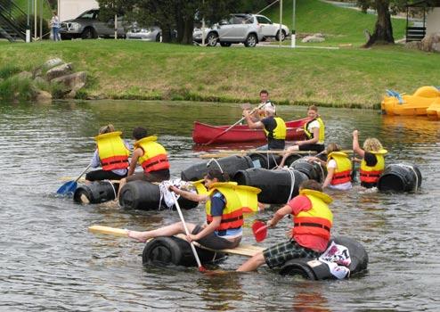 Raft Building Rafting Regatta This program will take your team through a long list of recreational and problem solving activities as they battle it out in the Lake Crackenback Raft Regatta.