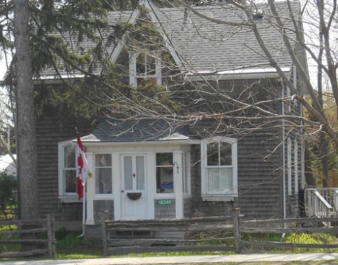 along the eaves. It replaced the original frame Presbyterian manse and after church union, served the ministers of Knox United Church until 1949, when the minister relocated to Alton.