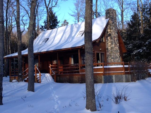 Michigan Cabin A week- long stay at a Harbor Springs area cabin located on Lake Michigan with snow skiing nearby This cabin, located in a private community just outside quaint Harbor Springs,