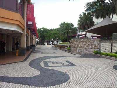 Discovery Bay plaza and leads out to the main sandy beach