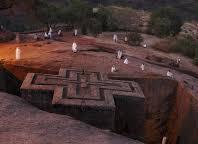 The small town of Lalibela in Ethiopia is home to one of the world s most astounding sacred sites: eleven rock-hewn churches, each carved entirely out of a single block of granite with its roof at