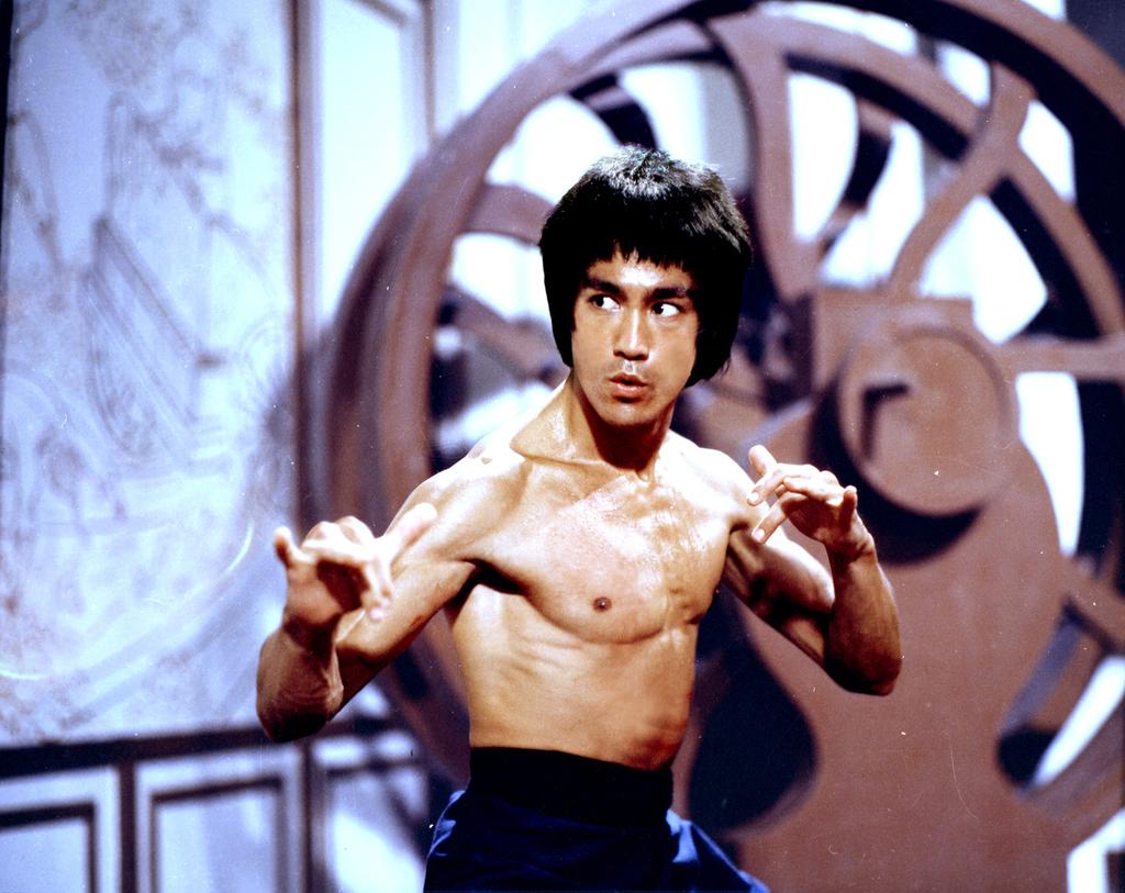 WHO WE ARE Bruce Lee is recognized as one of the most iconic and motivational figures of the 21st century, as a martial artist, entertainer, philosopher, and an example of unique