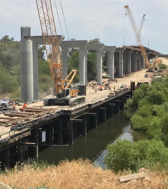 SAN JOAQUIN RIVER VIADUCT North Fresno At the San Joaquin River Viaduct, workers continue pouring concrete for