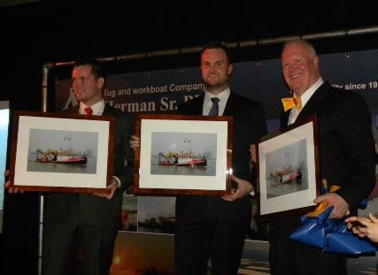 Owners showing their gifts from the yard Towingline thanks the yard Damen Shipyard Hardinxveld-Giessendam and owners Tug and workboat company Herman Sr.
