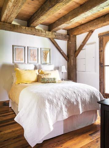 LEFT: This guest room is decorated with a pop of sunny yellow. RIGHT: The office on the landing upstairs is furnished with antiques.