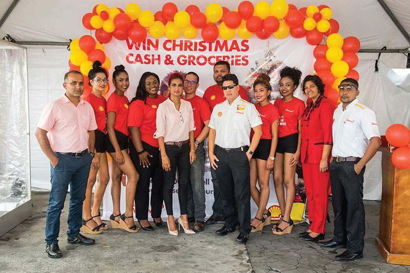 Sol Guyana Team at the new promotion launch Christmas Cash Winners Sol Guyana Launches the Win Christmas Cash & Groceries Promotion Sol Guyana successfully launched their