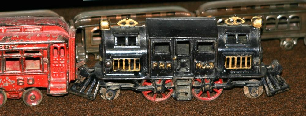 Page 3 This cast iron pull toy locomotive is unusual, in that cast iron toys rarely portrayed