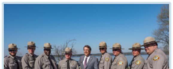 At the edge of the lake, McCrory was joined by Susan Kluttz, Secretary of the Department of Natural and Cultural Resources, Mike Murphy, state parks director, and delegations from