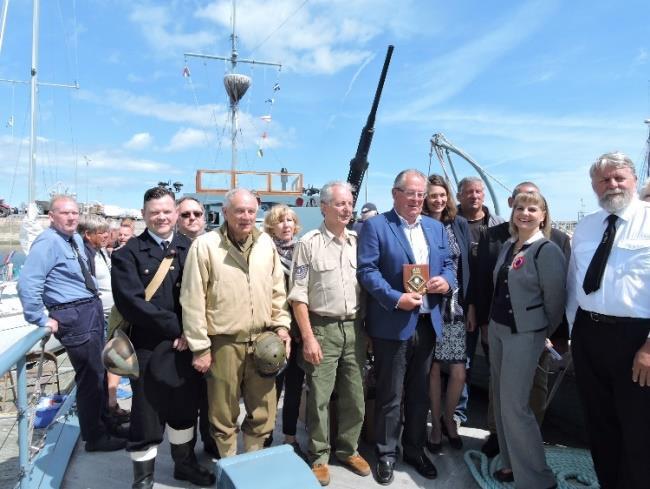 The Mayor of Grandcamp Maisy and civic guests on board We were made very welcome with a civic reception on board and so many visitors wishing to see us that the jetty submerged.