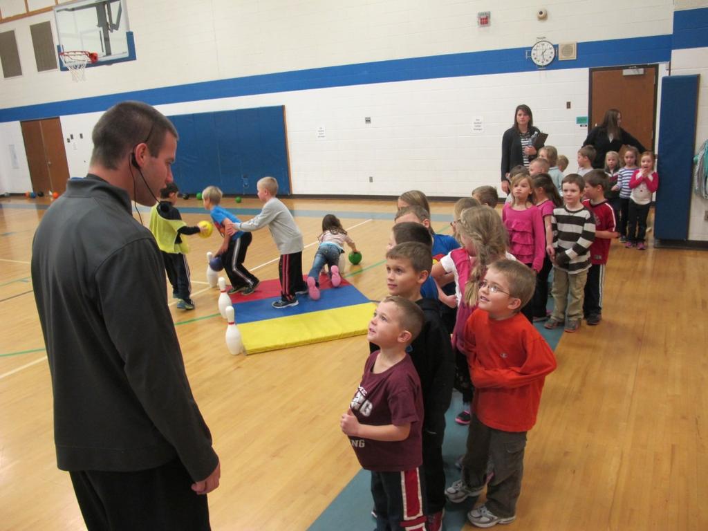 We finally got to the gym and found Mr. Timm working with first graders. Mr. Timm said he had seen our gingerbread man!