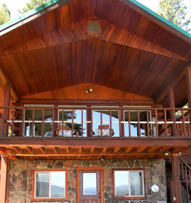 Improvements The 3,500± sf log home is ideally located tucked in the pines with beautiful views of the Grande Ronde Valley and the
