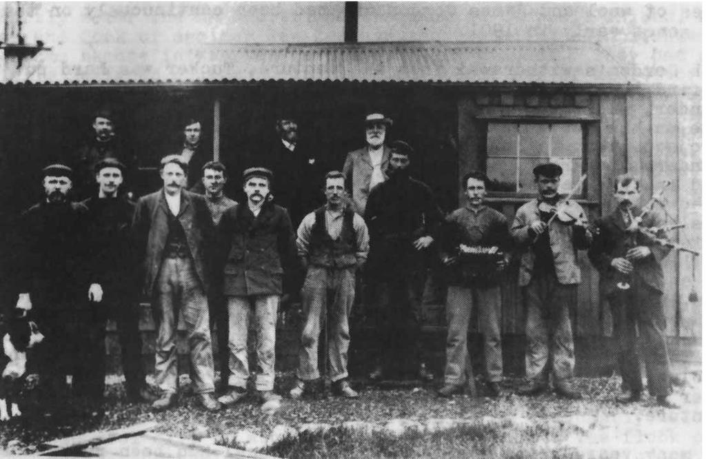Figure 48: Servicing 1906 style, was conducted with a three piece band in this historic shot at Tucker Cove, when the farm on Campbell Island was in full swing.