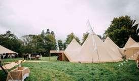 Historically, the only way you can get into a tipi is by a lifted side (if the weather is