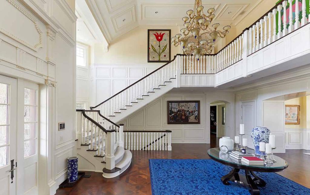 DOUBLE-HEIGHT ENTRY FOYER Inspired by excellence, the interior of the home is just as grand and